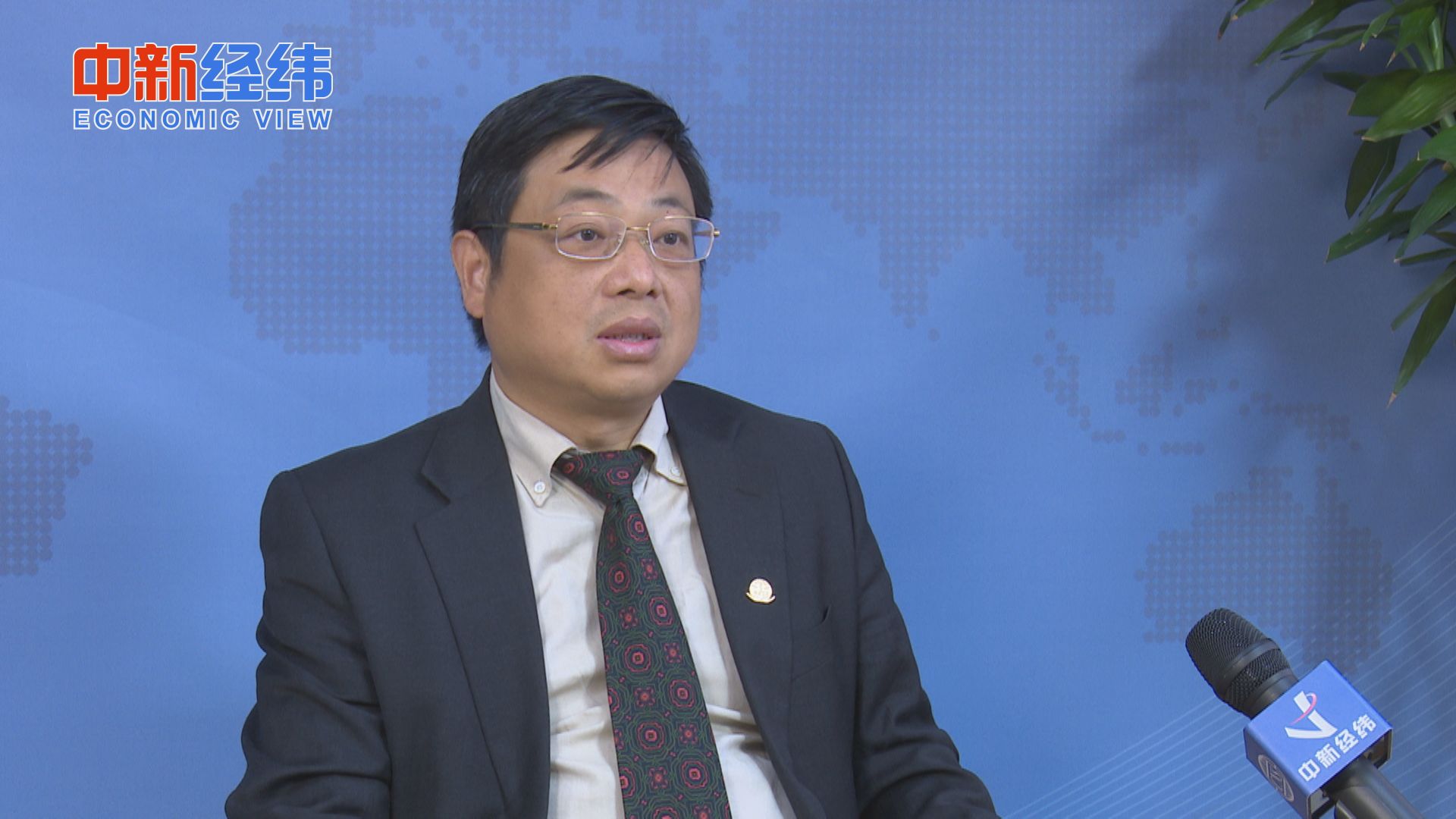 旅英华人张其军:建设"企业 高校"模式 推动高新技术产业化